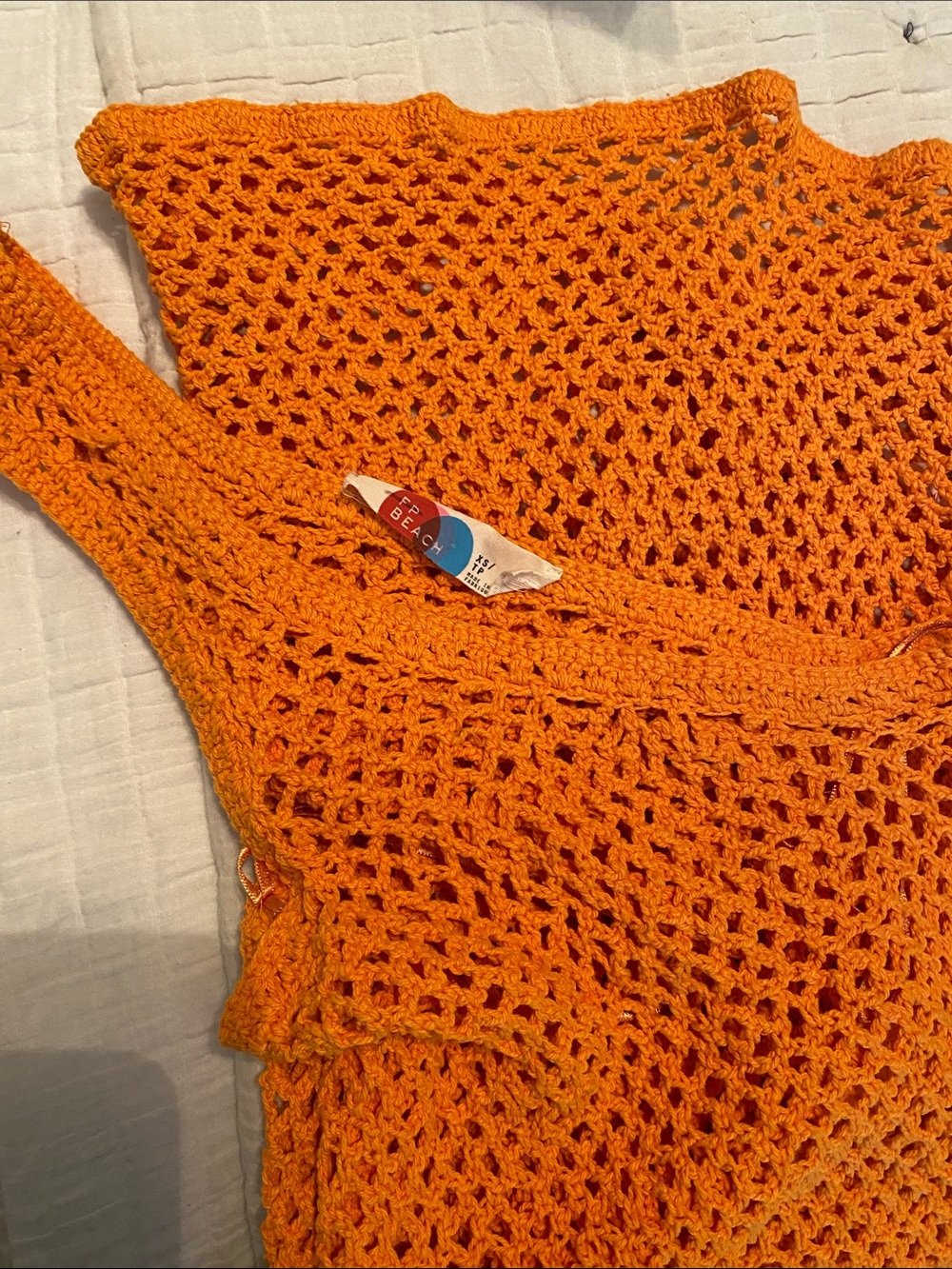 FP Beach Orange Crochet one shoulder beach cover up.